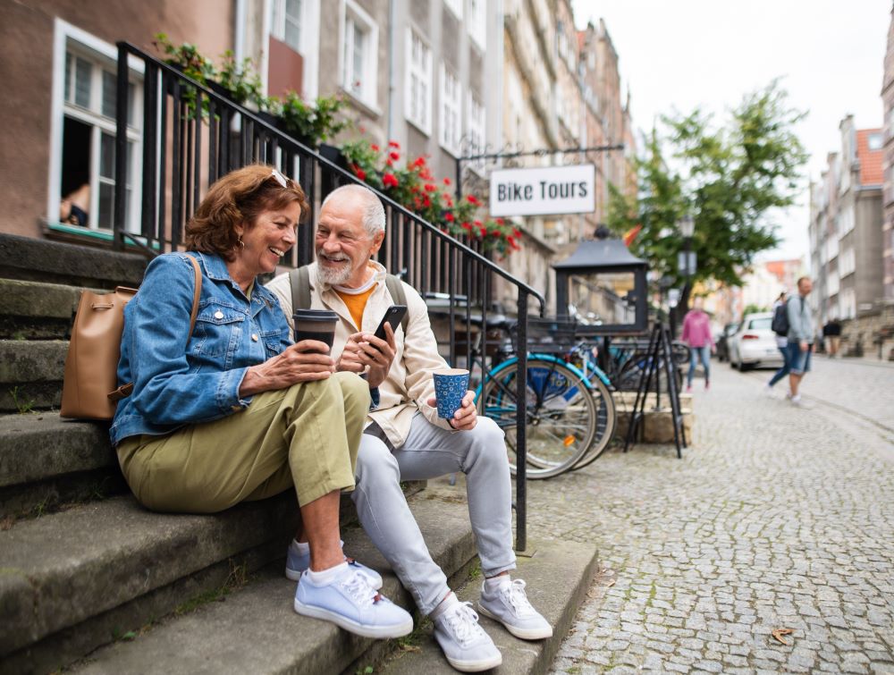 Retired couple on a walk in a European city 